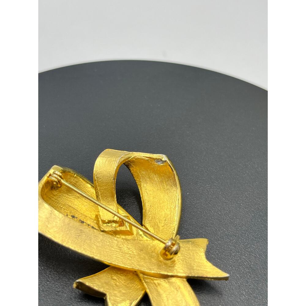 Vintage Gold Tone Rhinestone
Double Ribbon Brooch Pin
Unbranded - Picture 8 of 9